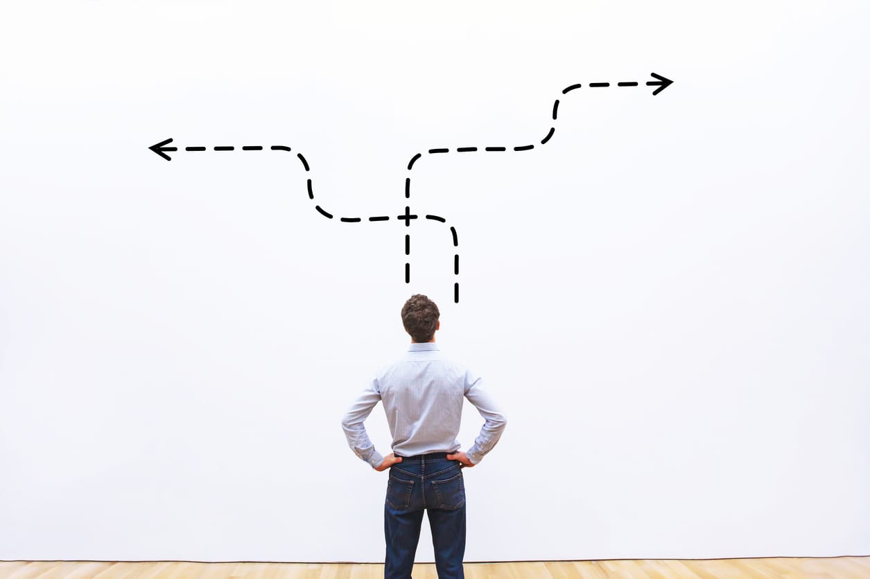 business strategy or decision making concept,  pensive businessman choosing direction